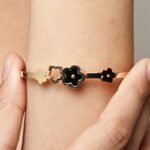 Gold-Tone Triple Flower Motif Bracelet