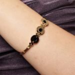 Elegant Gold-Plated Black Enamel Designer Bracelet